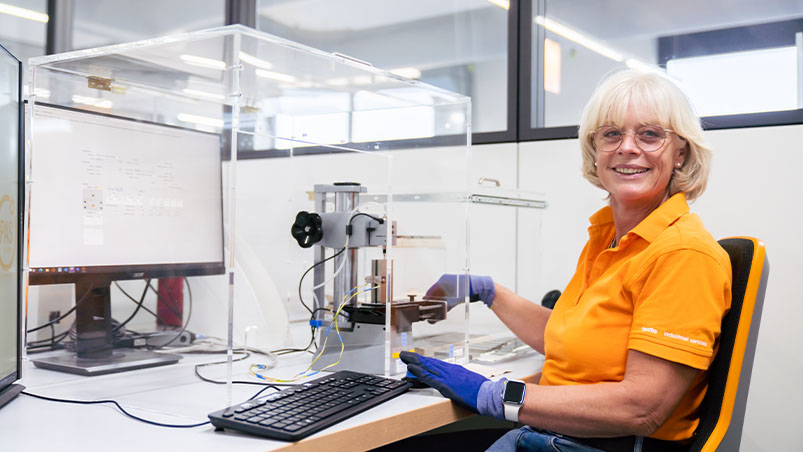 An employee calibrates measuring devices in the temperature-controlled calibration laboratory